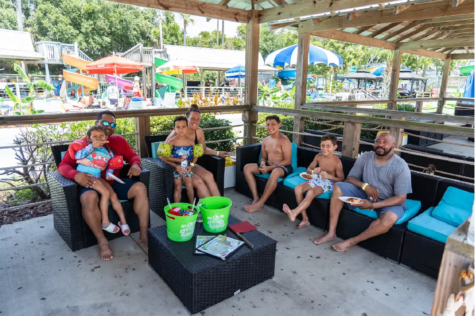 group relaxing in a cabana at Big Kahunas